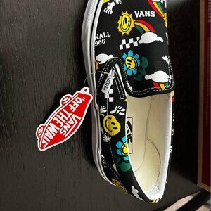 VAN'S BETTER DAYS BLACK SLIP ONS - SIZE 9.5 MENS OR SIZE 11 IN WOMENS